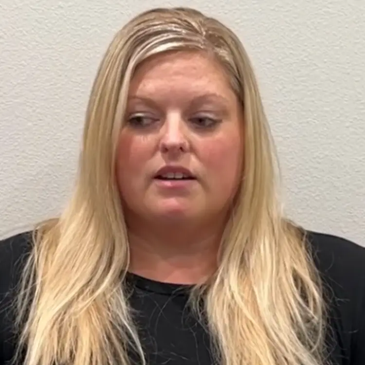 Woman with blonde hair sharing her healthcare experience in patient testimonial video
